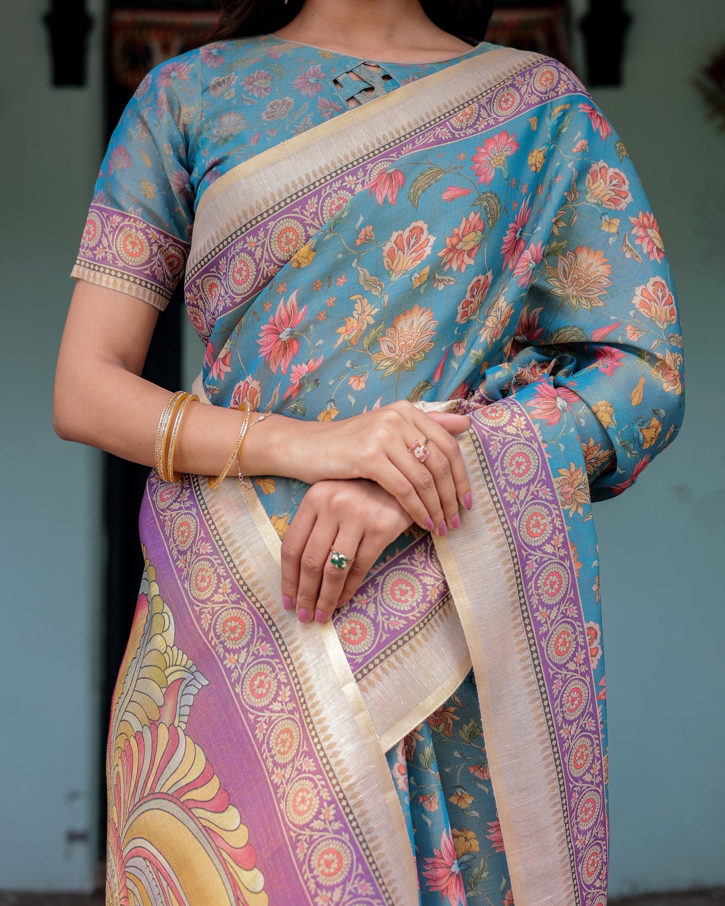 Aqua Blue Handloom Cotton Saree with Multicolor Floral Print & Royal Simha-Pakshi Pallu