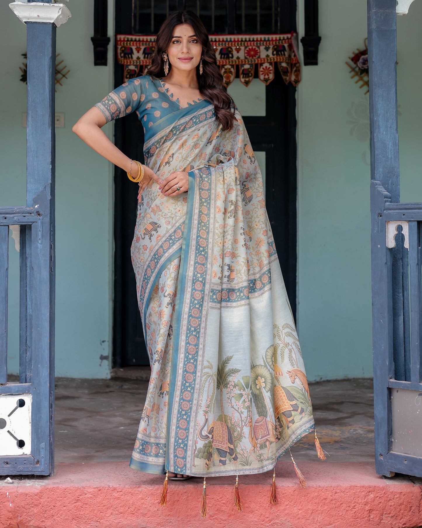 Icy Blue Handloom Cotton Saree with Peach Elephant Motifs & Royal Procession Pallu