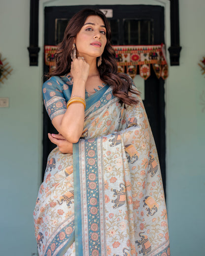 Icy Blue Handloom Cotton Saree with Peach Elephant Motifs & Royal Procession Pallu