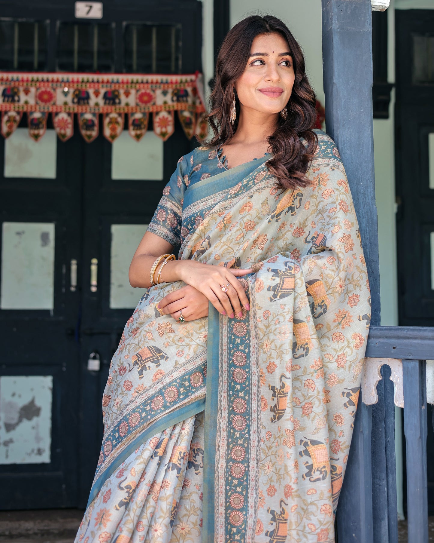 Icy Blue Handloom Cotton Saree with Peach Elephant Motifs & Royal Procession Pallu