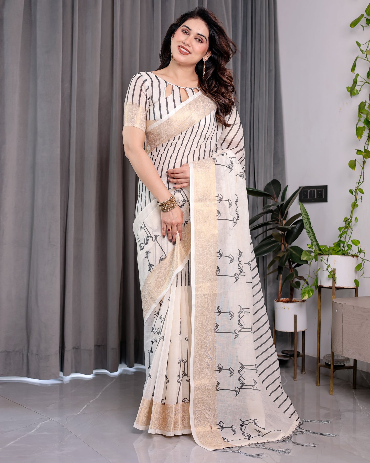 Off-White Handloom Linen Saree with Black Vertical Stripes & Tribal Motifs | Golden Zari Border & Tassel Pallu | Attached Blouse | 5.5m Saree + 0.8m Blouse