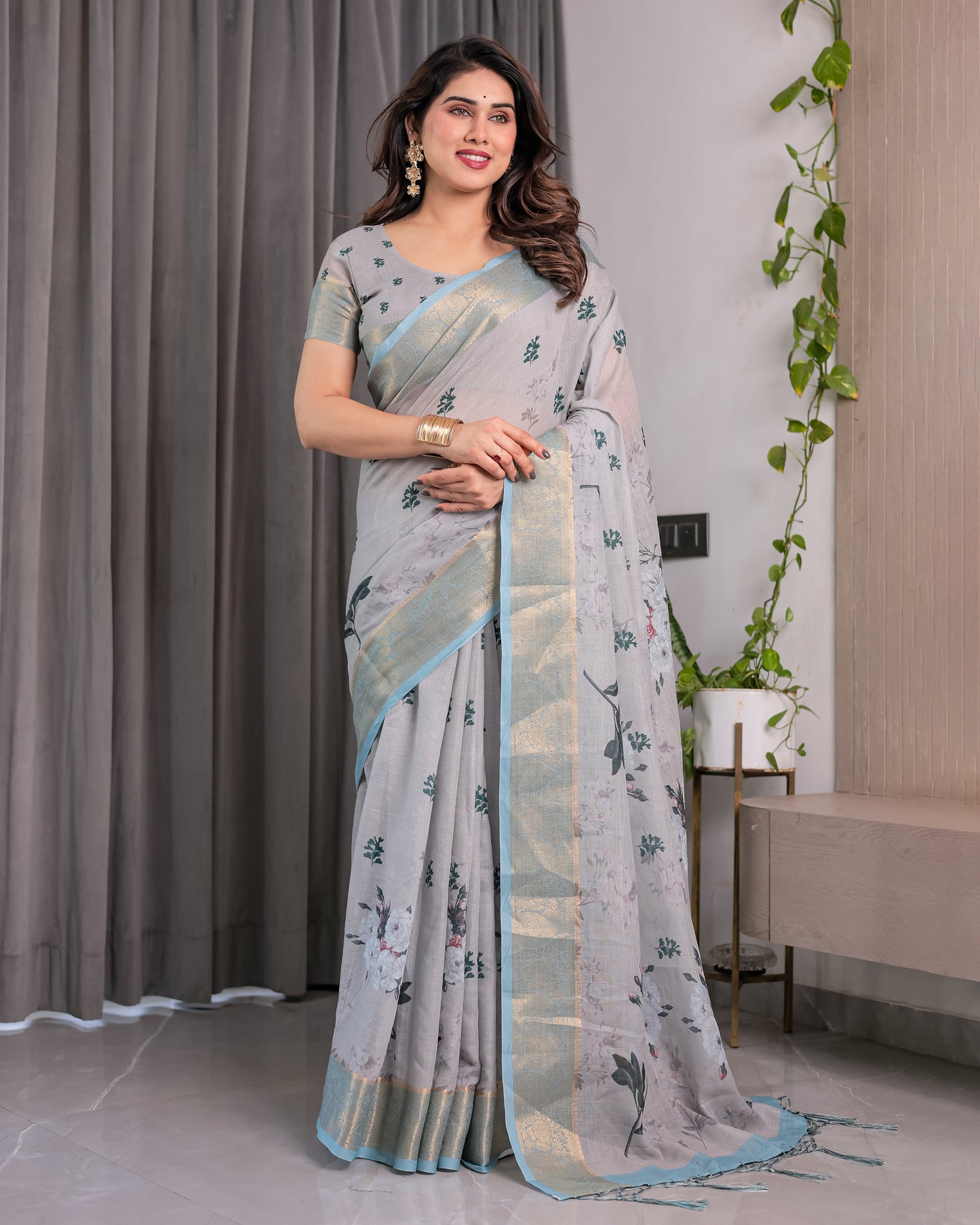 Elegant Ice Grey Handloom Linen Saree with Floral Print, Gold Zari Border & Tassel Detailing | Attached Blouse Piece | 5.5m Saree + 0.8m Blouse