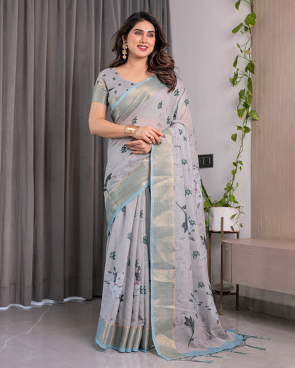 Elegant Ice Grey Handloom Linen Saree with Floral Print, Gold Zari Border & Tassel Detailing | Attached Blouse Piece | 5.5m Saree + 0.8m Blouse