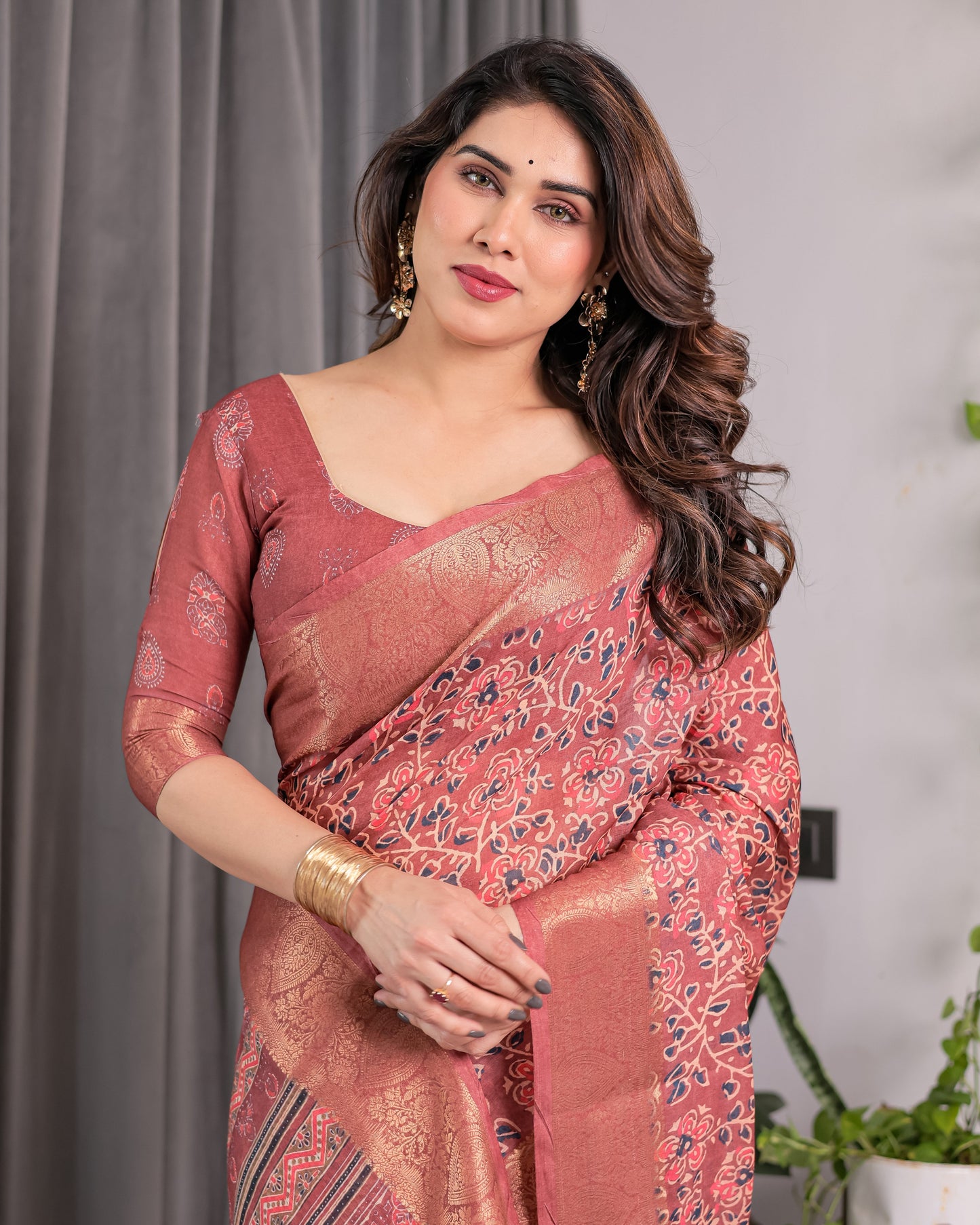 Rust Maroon Handloom Linen Saree with All-Over Floral Print & Ornate Traditional Pallu | Gold Zari Border & Tassel Finish | Attached Blouse | 5.5m Saree + 0.8m Blouse