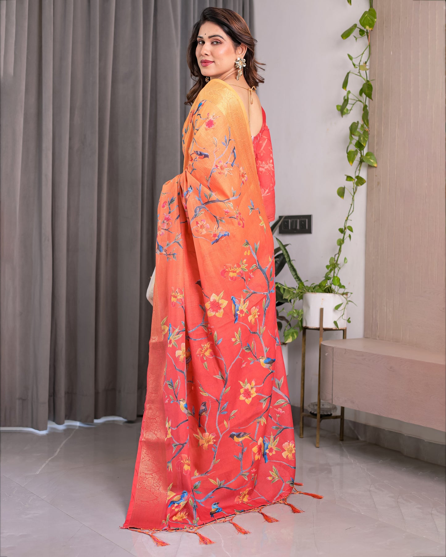 Sunset Orange Handloom Linen Saree with Bluebird & Floral Digital Print | Contrasting Red Pallu & Gold Zari Border | Tassel Detailing | Attached Blouse | 5.5m Saree + 0.8m Blouse