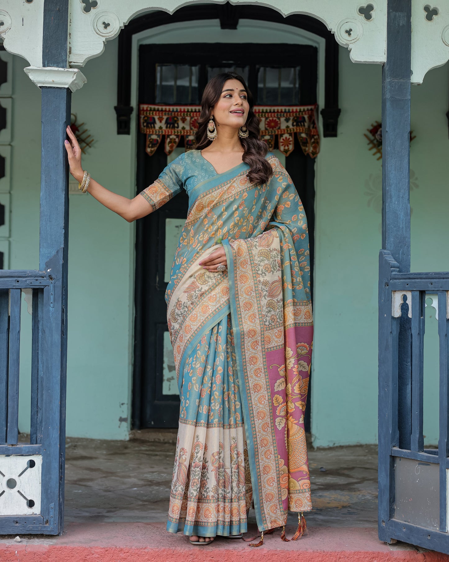 Turquoise Blue Handloom Cotton Saree with Multicolor Floral Pallu & Peach Border
