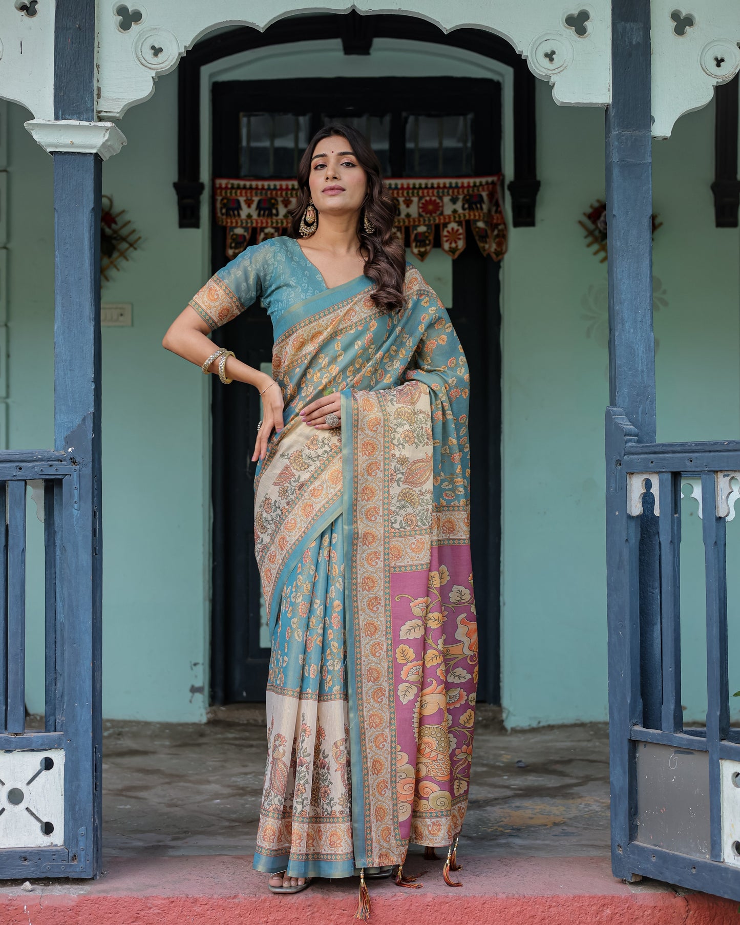 Turquoise Blue Handloom Cotton Saree with Multicolor Floral Pallu & Peach Border