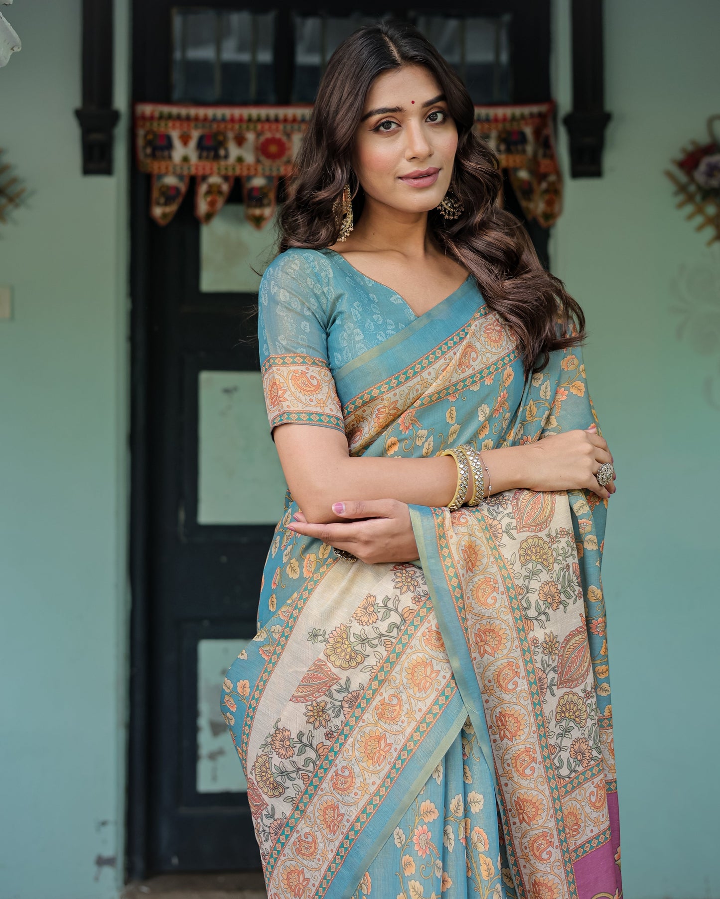 Turquoise Blue Handloom Cotton Saree with Multicolor Floral Pallu & Peach Border